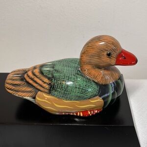 Vintage hand-painted ceramic duck figurine. Perfect for bird collectors